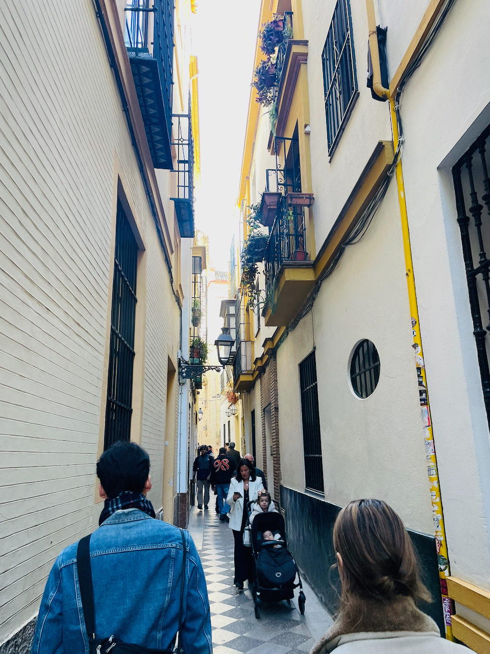 A narrow street in seville.