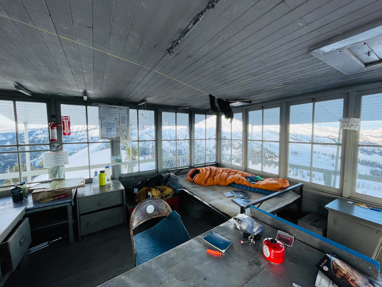 sleeping bag set up on a bed in the lookout