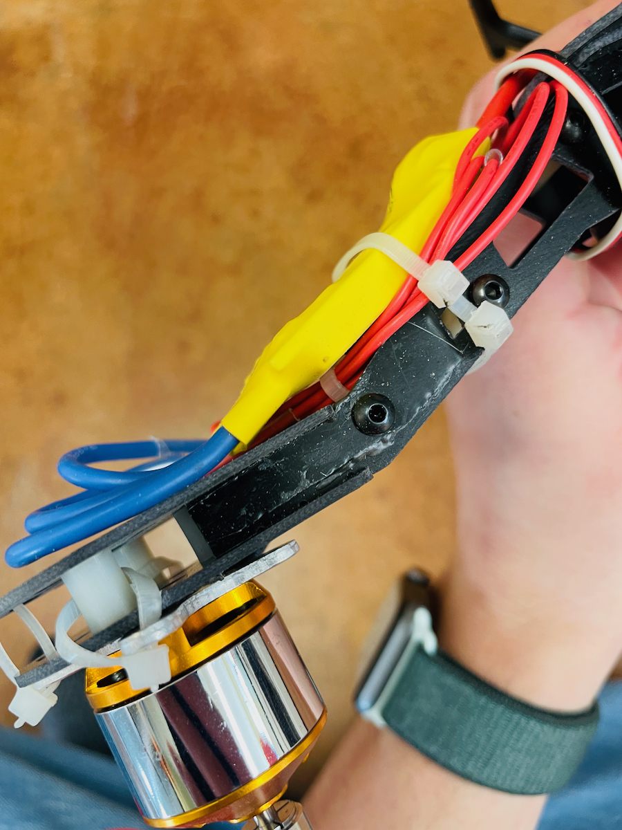 one drone arm is repaired using a metal plate