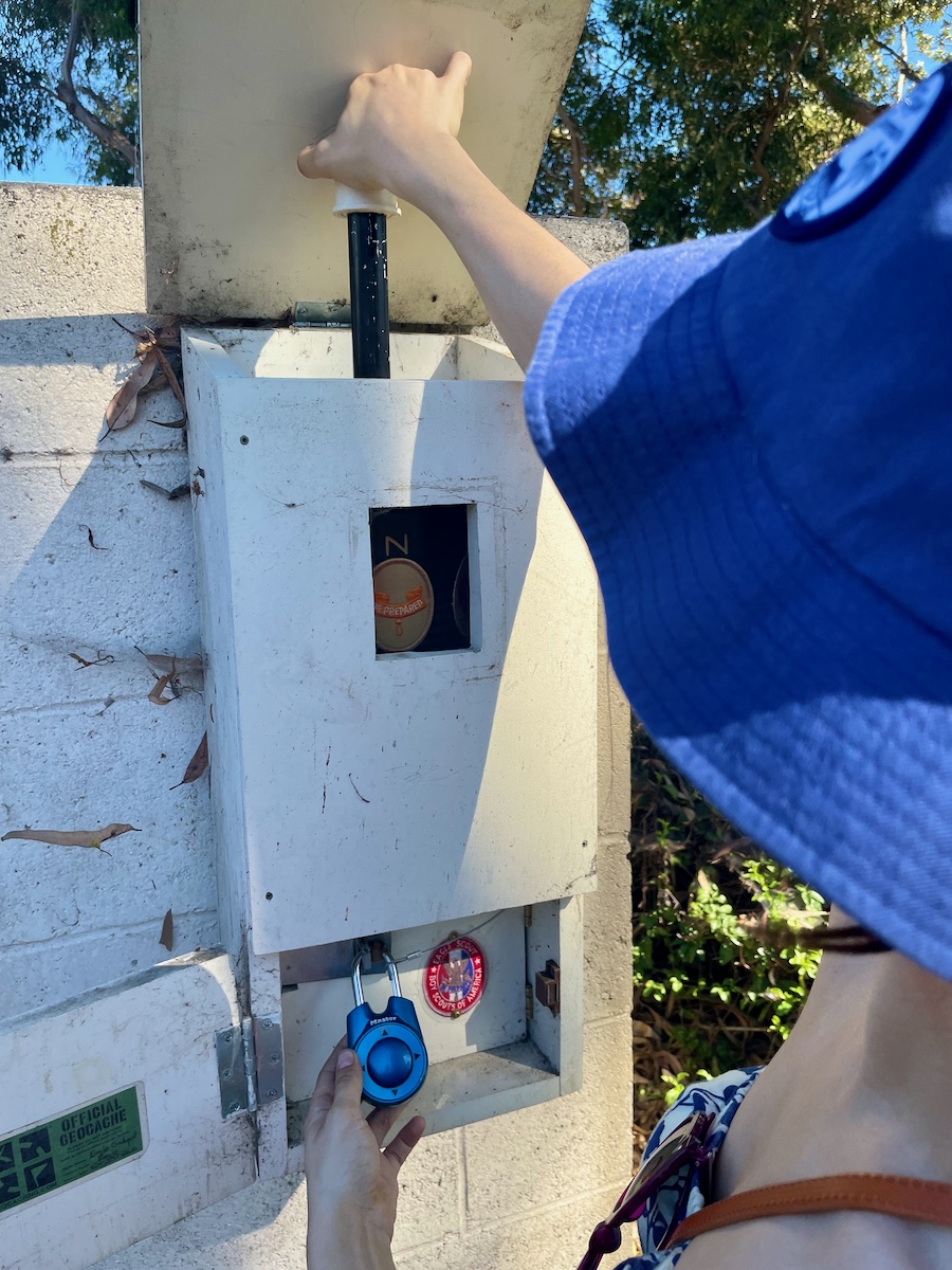 box with a lock and rotating viewing window